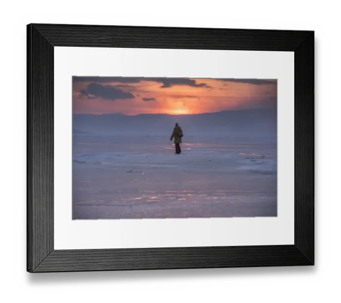 Framed Print : a man walking on a frozen lake Baikal Framed Print : a man walking on a frozen lake Baikal