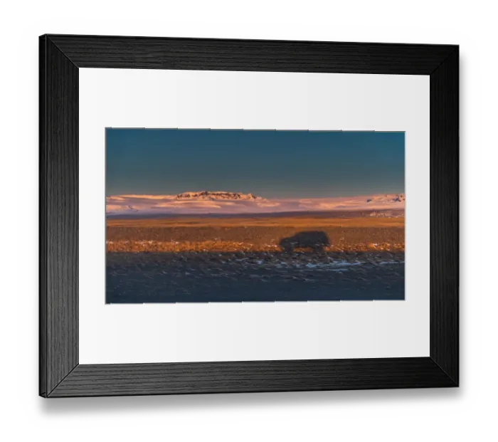 Framed Print : a car shadow cast on an iceland landscape
