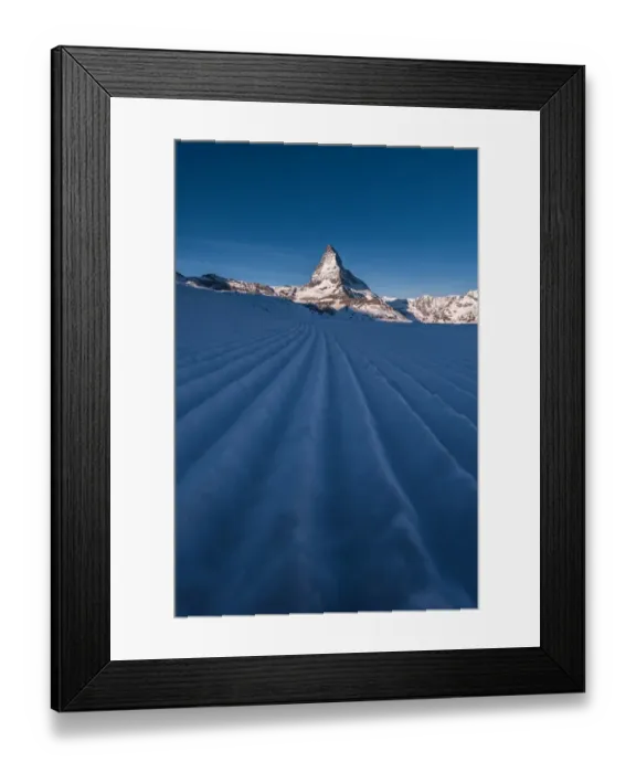 Framed Print : Snow ski track pattern with Matterhorn background Framed Print : Snow ski track pattern with Matterhorn background