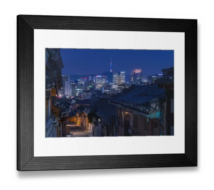 Framed Print : Bukchon Hanok village at night with Seoul city background Framed Print : Bukchon Hanok village at night with Seoul city background