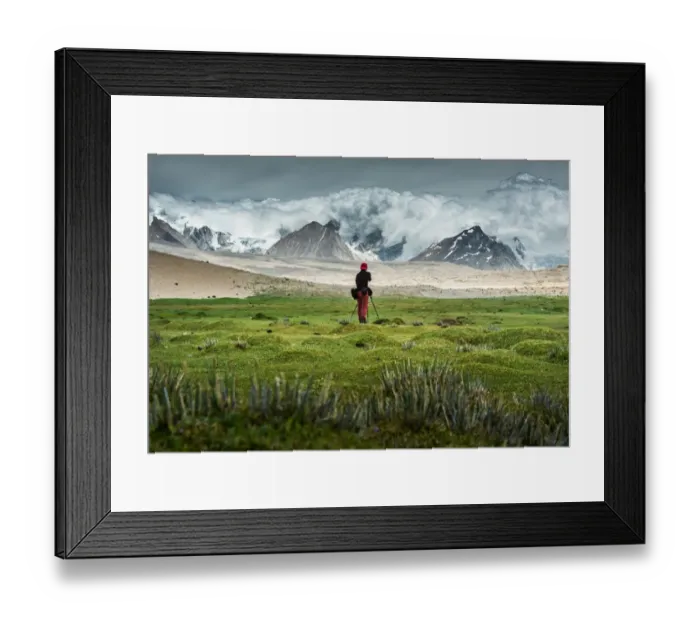 Framed Print : Man shooting at Himalayas Framed Print : Man shooting at Himalayas