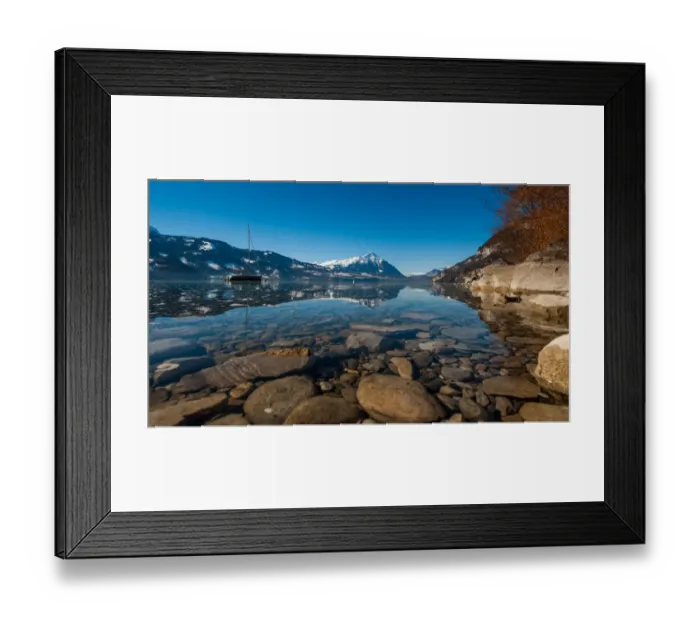 Framed Print : Landscape view of lake Thun with reflection in water Framed Print : Landscape view of lake Thun with reflection in water