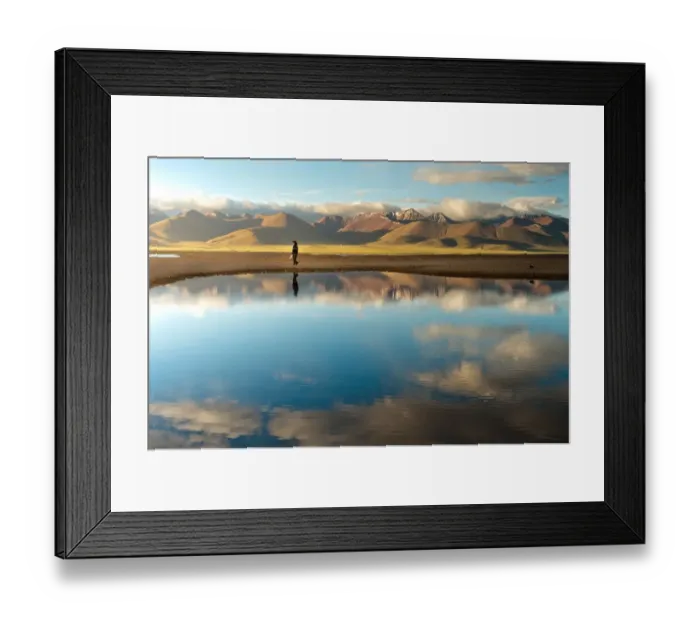 Framed Print : Woman walk along Namtso lake in Tibet Framed Print : Woman walk along Namtso lake in Tibet