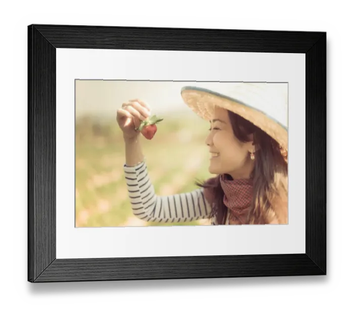 Framed Print : Woman looking at strawberry with happy face Framed Print : Woman looking at strawberry with happy face