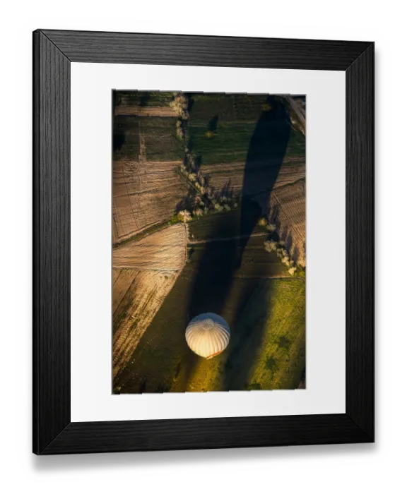 Framed Print : Morning balloon over the field in aerial view