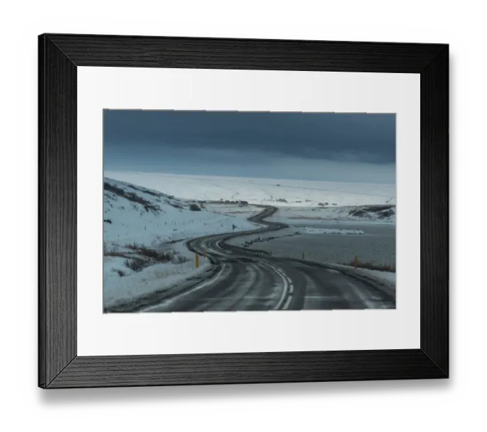 Framed Print : Winding road through Iceland winter landscape