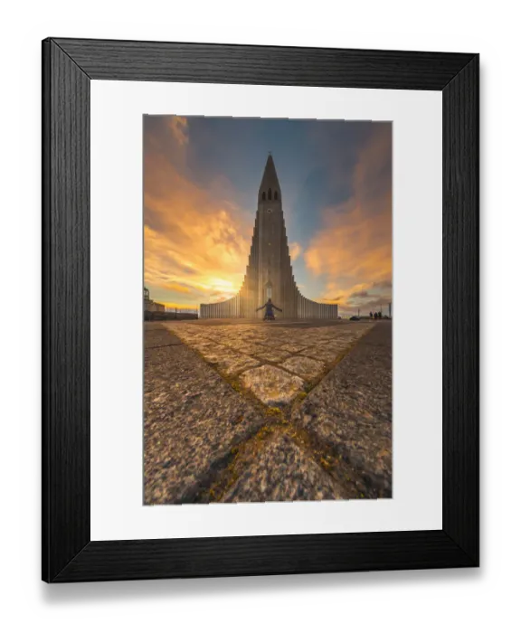 Framed Print : a man kneel down in front of Hallgrimskirkja, Iceland Framed Print : a man kneel down in front of Hallgrimskirkja, Iceland