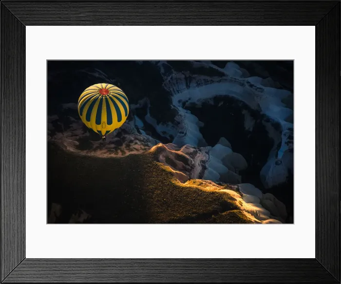 Framed Print : Hot air balloon over volcanic rock formation Framed Print : Hot air balloon over volcanic rock formation