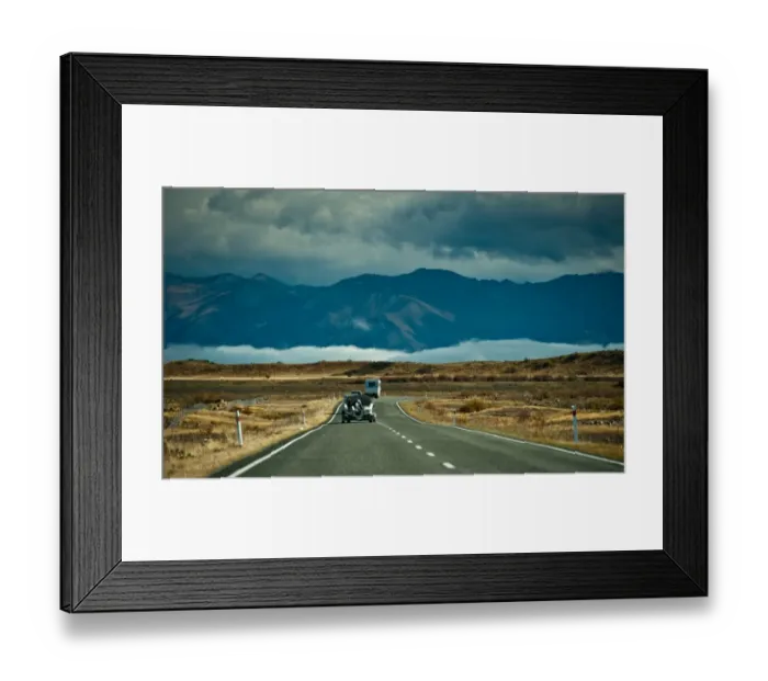 Framed Print : Countryside road with mountain and low cloud Framed Print : Countryside road with mountain and low cloud
