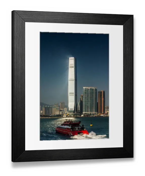 Framed Print : Ray of light over a high rise in Hong kong Framed Print : Ray of light over a high rise in Hong kong