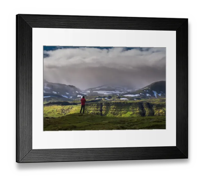Framed Print : a man standing in front of iceland mountain landscape Framed Print : a man standing in front of iceland mountain landscape