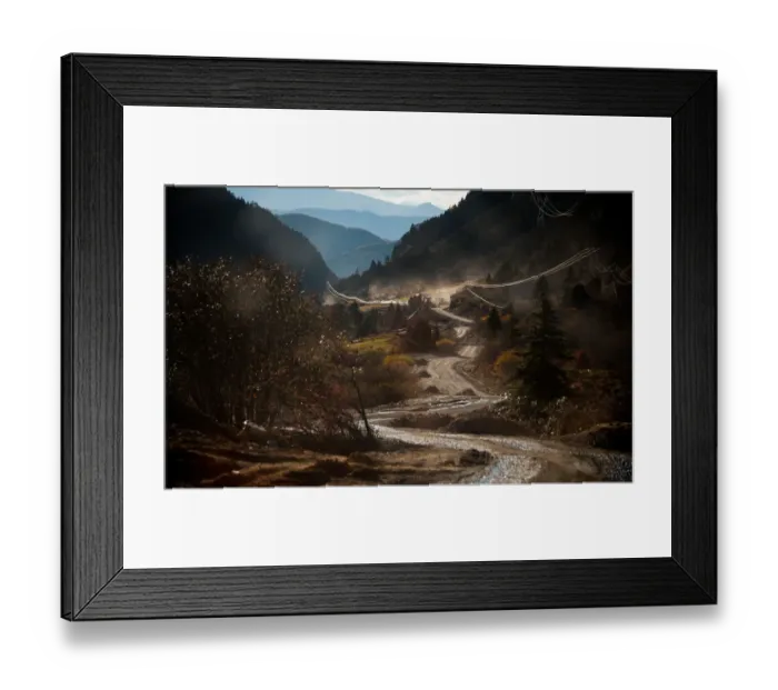 Framed Print : Dirt road through valley Framed Print : Dirt road through valley
