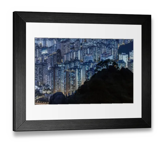 Framed Print : Silhouette of mountain over illuminated Hong Kong Framed Print : Silhouette of mountain over illuminated Hong Kong