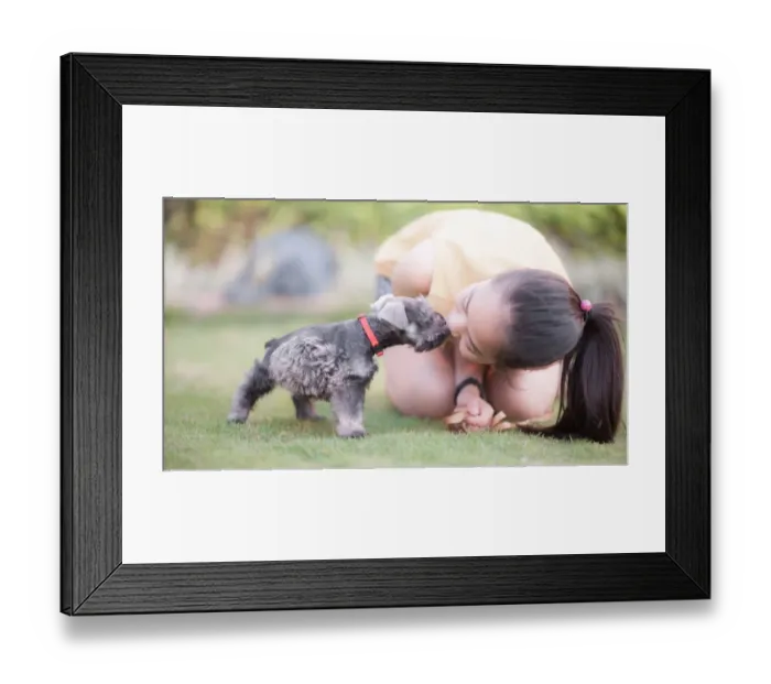 Framed Print : Woman with puppy Framed Print : Woman with puppy