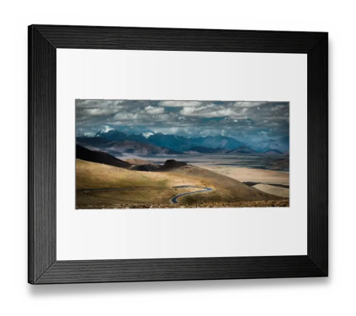 Framed Print : Meandering road over Tibetan hill side