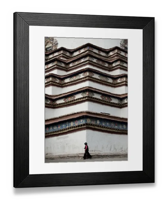 Framed Print : Lady walking in front of Tibetan Stupa Framed Print : Lady walking in front of Tibetan Stupa