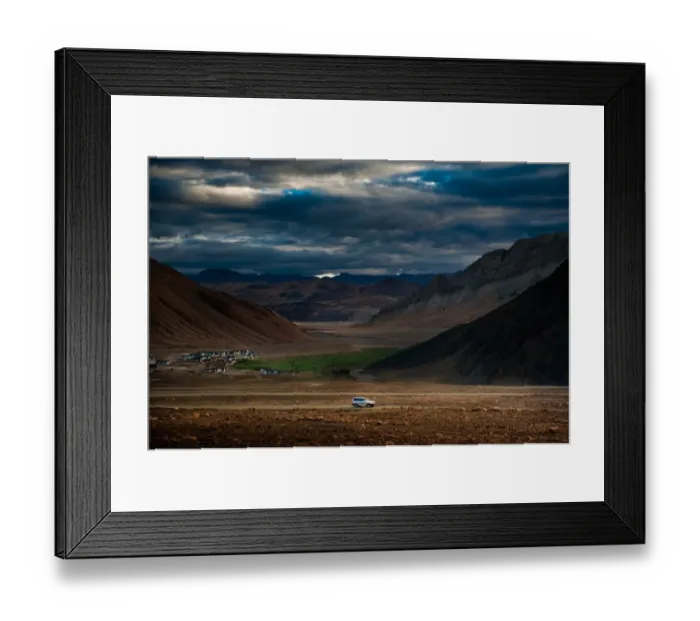 Framed Print : Car driving in valley