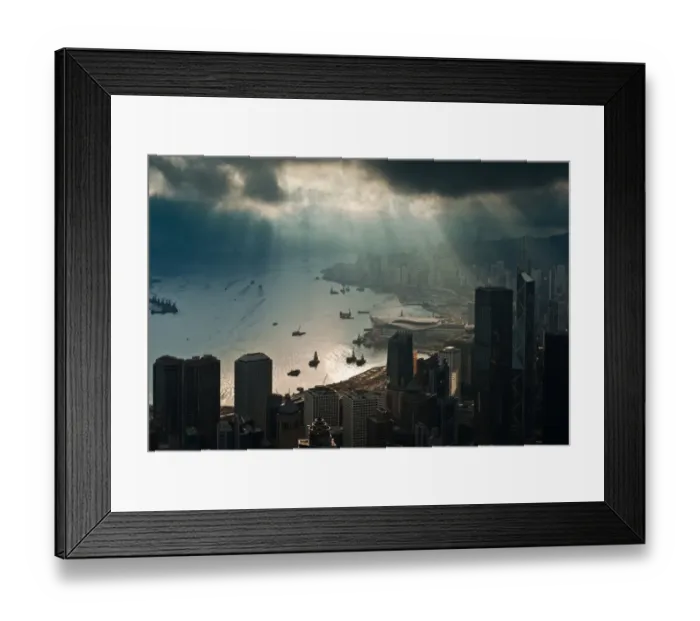 Framed Print : Hongkong with ray of light through sky