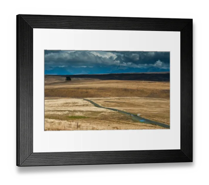 Framed Print : Grass field and road from Mt. John Framed Print : Grass field and road from Mt. John