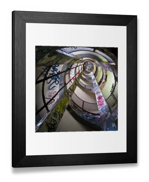 Framed Print : Frigos. Spiral staircase seen from above. Graffitti Framed Print : Frigos. Spiral staircase seen from above. Graffitti