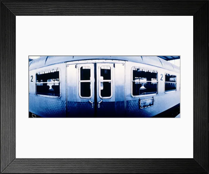 Framed Print : Passenger train carriage in station hall (wide angle) Framed Print : Passenger train carriage in station hall (wide angle)