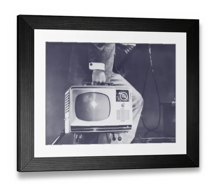 Framed Print : Man carrying portable television up steps, low section (B&W) Framed Print : Man carrying portable television up steps, low section (B&W)