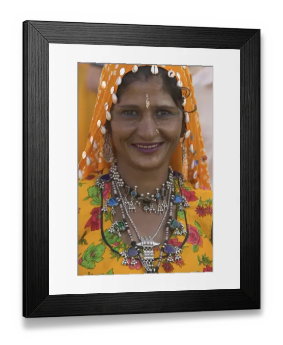 Framed Print : Woman in headscarf and jewelry smiling, close-up, portrait Framed Print : Woman in headscarf and jewelry smiling, close-up, portrait