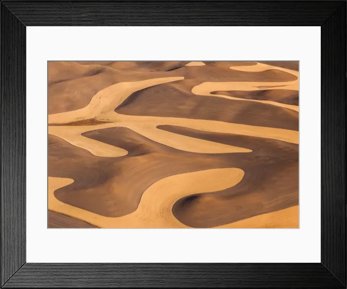 Framed Print : Farmland landscape, with ploughed fields and furrows in Palouse, Washington, USA. An aerial view with natural patterns
