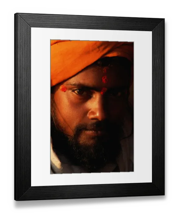 Framed Print : India, Uttar Pradesh, Varanasi, sadhu (holy man), portrait, close-up Framed Print : India, Uttar Pradesh, Varanasi, sadhu (holy man), portrait, close-up