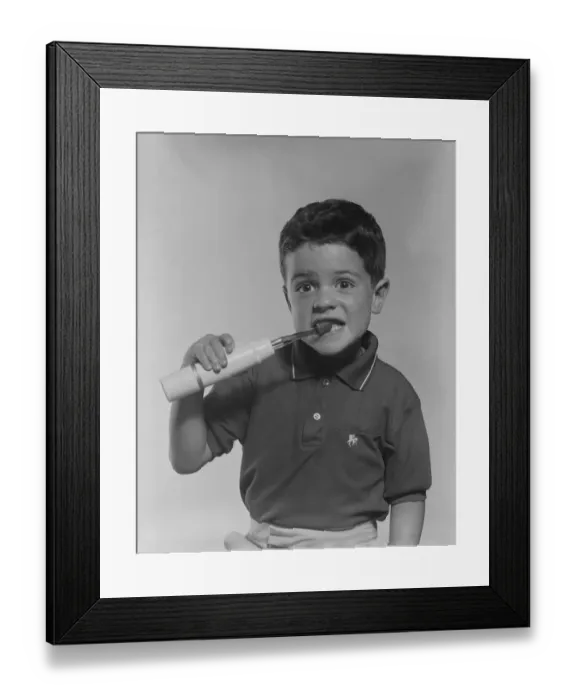 Framed Print : Boy brushing teeth, portrait Framed Print : Boy brushing teeth, portrait