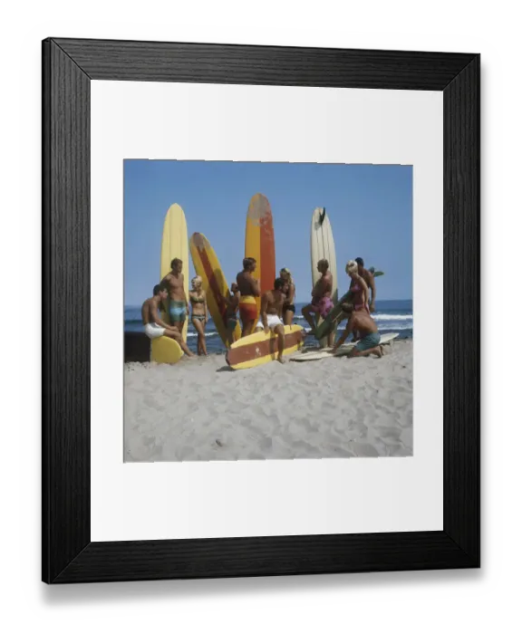 Framed Print : Surfers holding surfboards on beach Framed Print : Surfers holding surfboards on beach
