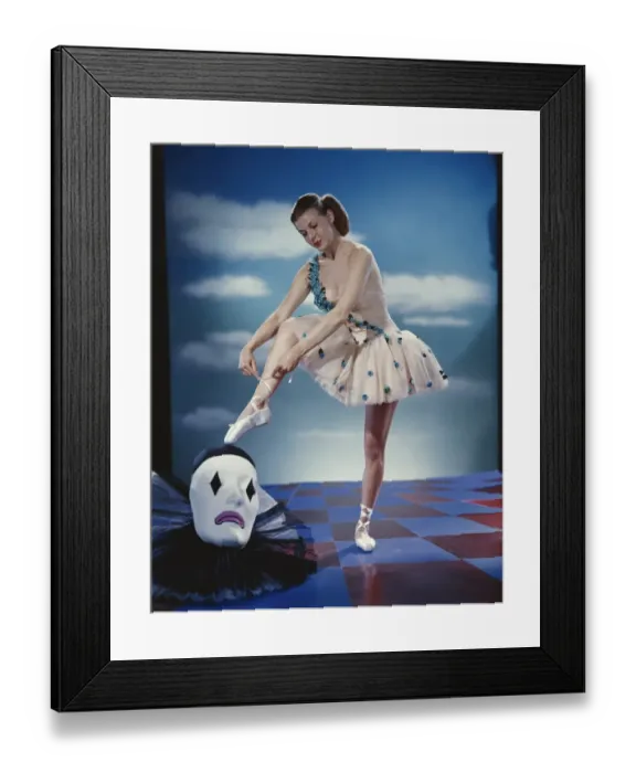 Framed Print : Young ballet dancer tying ballet slippers Framed Print : Young ballet dancer tying ballet slippers