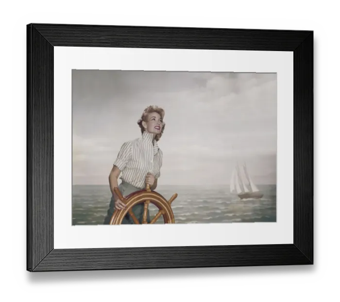 Framed Print : Young woman holding steering wheel Framed Print : Young woman holding steering wheel
