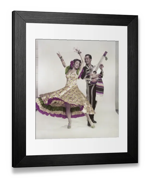 Framed Print : Woman dancing while man playing guitar against white background