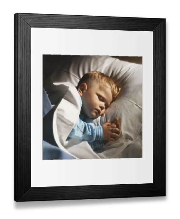 Framed Print : Boy sleeping on bed