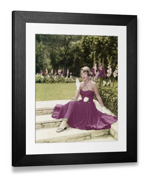 Framed Print : Young woman smoking cigarette in garden, portrait Framed Print : Young woman smoking cigarette in garden, portrait