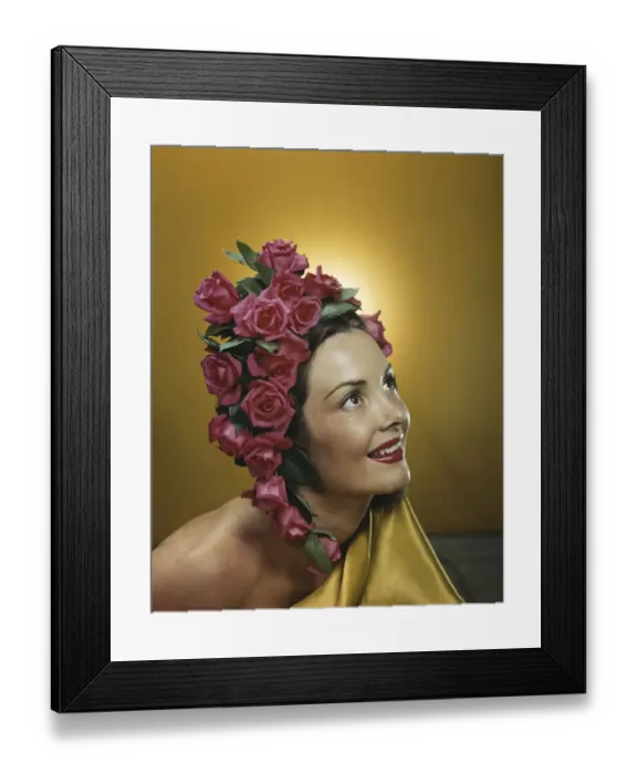 Framed Print : Young woman wearing flowers in hair, smiling, close-up Framed Print : Young woman wearing flowers in hair, smiling, close-up