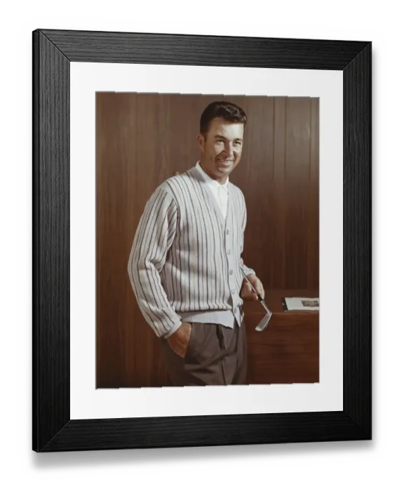 Framed Print : Man holding golf club, smiling Framed Print : Man holding golf club, smiling