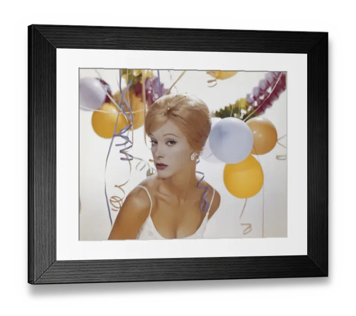 Framed Print : Young woman with decoration in background, portrait Framed Print : Young woman with decoration in background, portrait