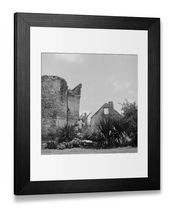 Framed Print : Family standing beside old ruined, father pointing Framed Print : Family standing beside old ruined, father pointing