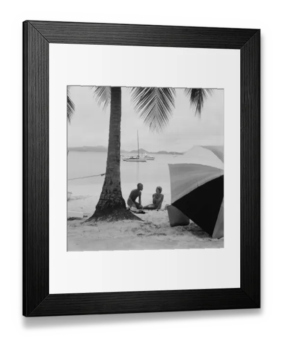 Framed Print : Couple having fun on beach, smiling Framed Print : Couple having fun on beach, smiling