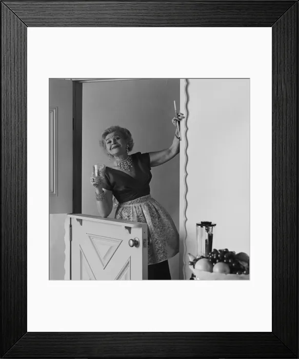Framed Print : Woman holding measuring cup, portrait Framed Print : Woman holding measuring cup, portrait