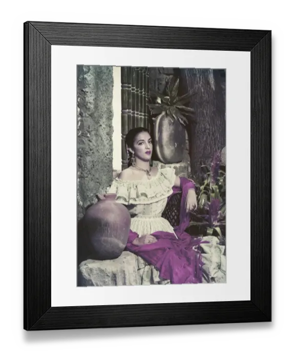 Framed Print : Young woman sitting beside pot plat, portrait Framed Print : Young woman sitting beside pot plat, portrait