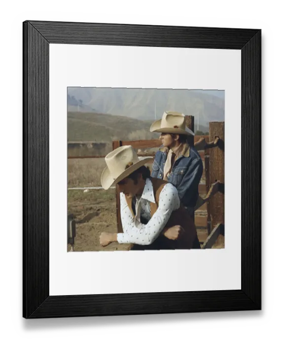 Framed Print : Young cowboys leaning on fence Framed Print : Young cowboys leaning on fence