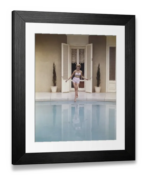 Framed Print : Woman touching water with foot Framed Print : Woman touching water with foot