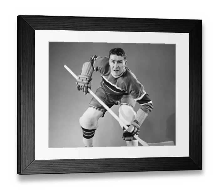 Framed Print : Hockey player in defensive stance Framed Print : Hockey player in defensive stance