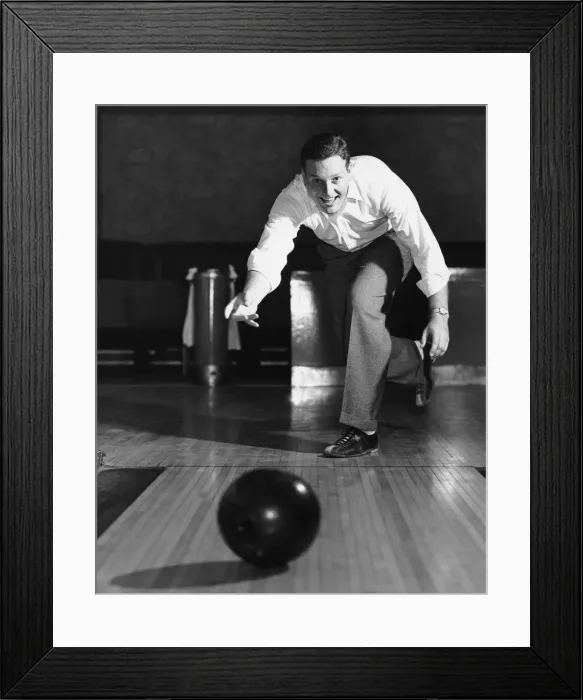 Framed Print : Man throwing bowling ball down lane Framed Print : Man throwing bowling ball down lane