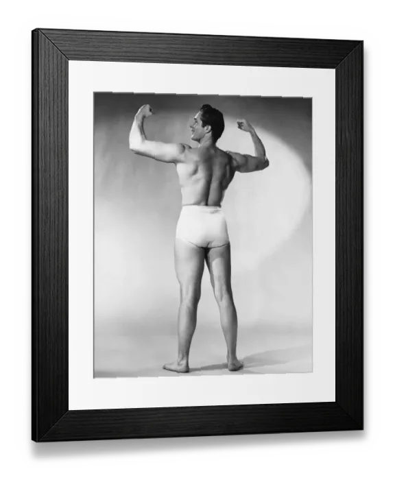 Framed Print : Man flexing muscles Framed Print : Man flexing muscles
