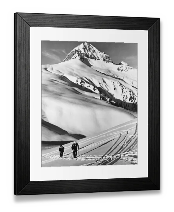 Framed Print : Couple cross-country skiing in mountains Framed Print : Couple cross-country skiing in mountains