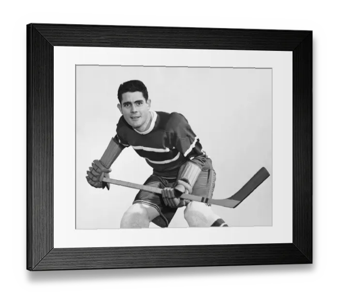 Framed Print : Hockey player holding stick Framed Print : Hockey player holding stick